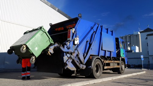 Business professionals discussing waste removal strategies